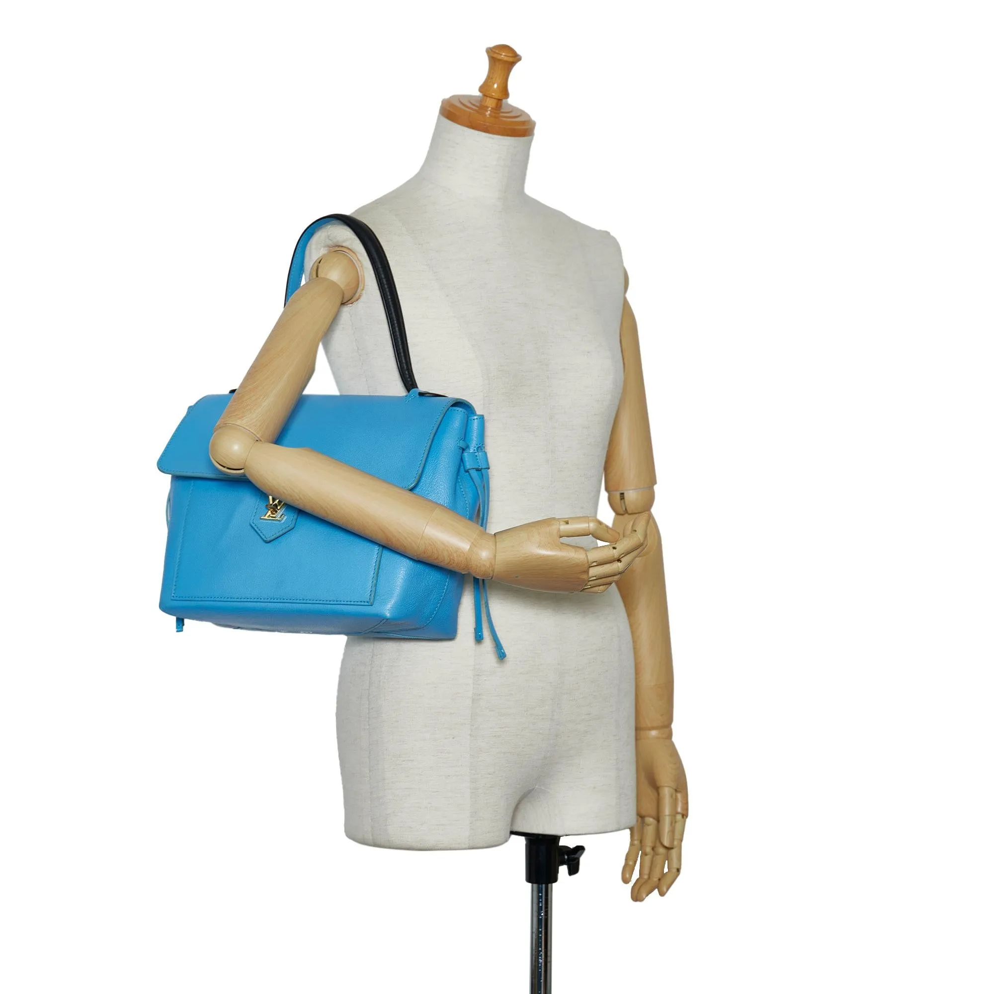 Louis Vuitton LockMe MM (SHG-7EuJqm)